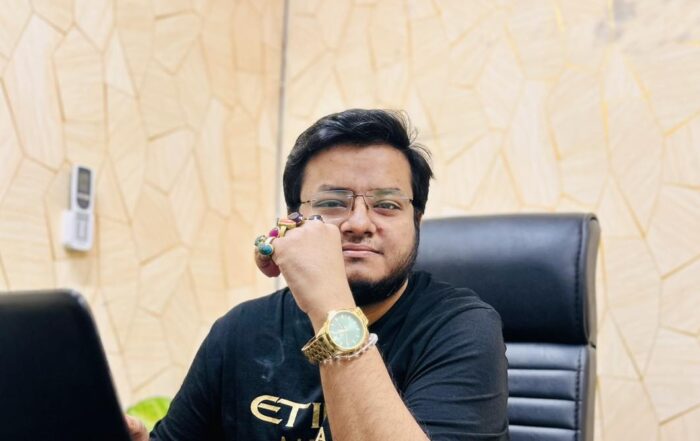 Astrologer Musa Hossain reading a birth chart at his Malibag, Dhaka chamber