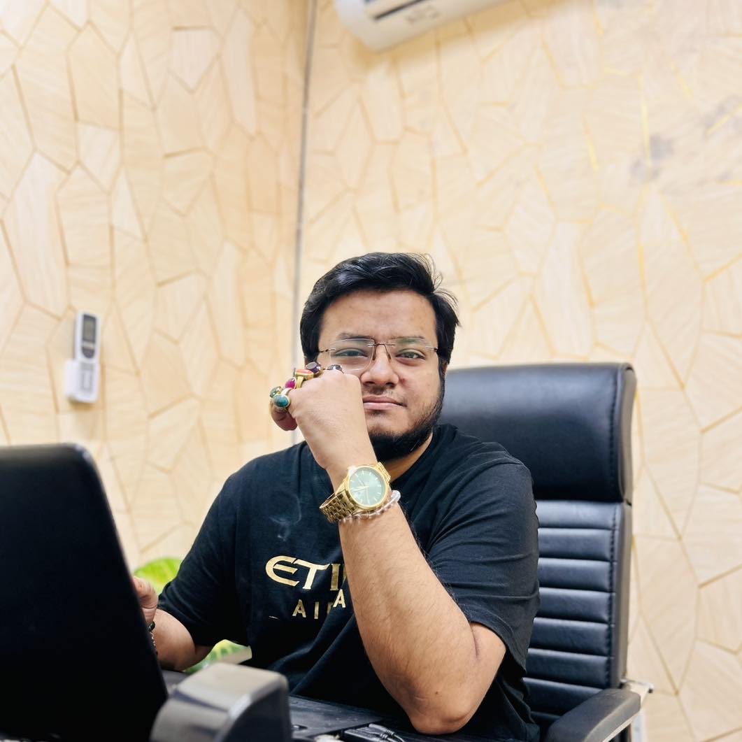 Astrologer Musa Hossain reading a birth chart at his Malibag, Dhaka chamber