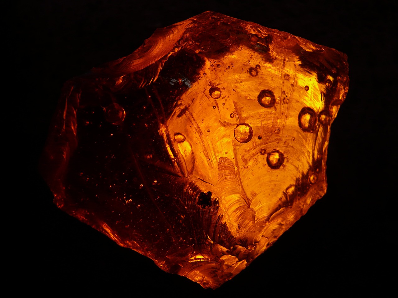 Unveiling the Radiance of Amber: Properties, Healing, and Manifestation